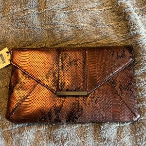 Elegant Pinky/Purlish Metallic Colored Snakeskin Clutch